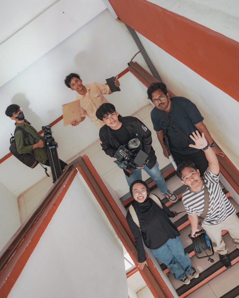 Top-down shot of the crew on a staircase — Profile video, Faculty of Science and Mathematics, Undip
