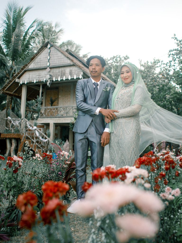 The couple in a flower garden — Wedding, Isma & Opik