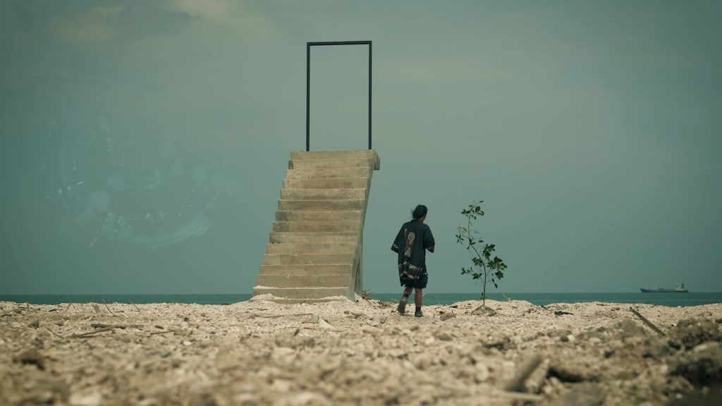 A surreal frame: a door on the beach — ZAKAR
