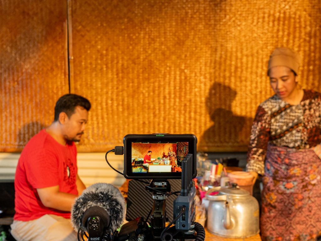 A warm production set with monitor and actors — Peaceful Local Elections short film series